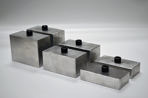 Billet aluminum trailer blocks in several heights